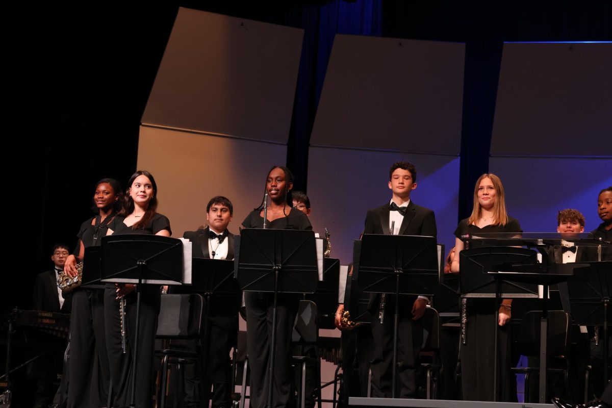 band standing up as they had finished their music at Wylie East theater.