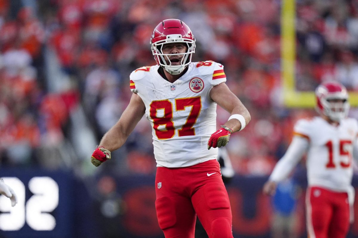Nov 16, 2025; Denver, Colorado, USA; Kansas City Chiefs tight end Travis Kelce (87) reacts in the third quarter against the Denver Broncos at Empower Field at Mile High. Mandatory Credit: Ron Chenoy-Imagn Images