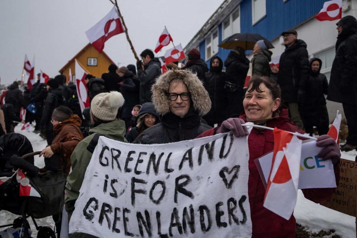People attend a protest against U.S. President Donald Trump's demand that the Arctic island be ceded to the U.S., calling for it to be allowed to determine its own future, in front of the U.S. consulate in Nuuk, Greenland, January 17, 2026. REUTERS/Marko Djurica