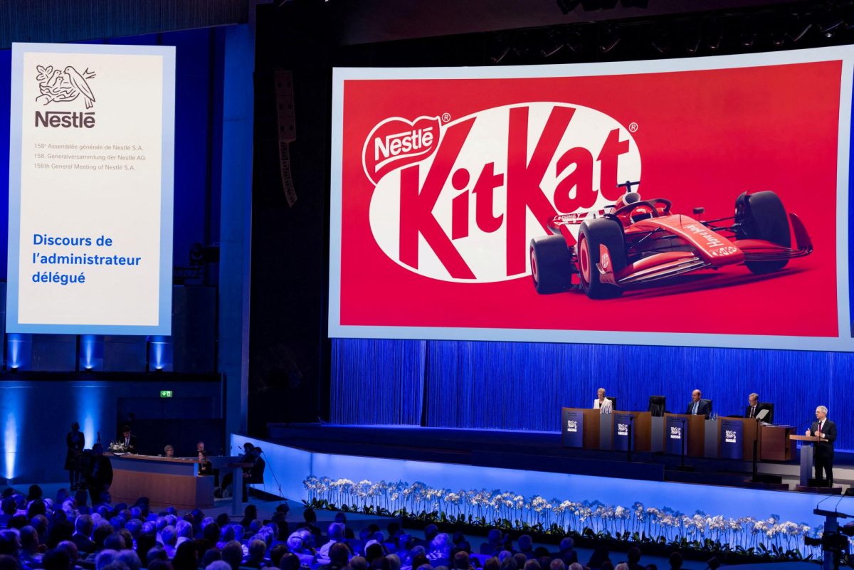 KitKat branding appears onscreen at the company's Annual General Meeting in Ecublens near Lausanne, Switzerland, April 16, 2025. REUTERS/Pierre Albouy
