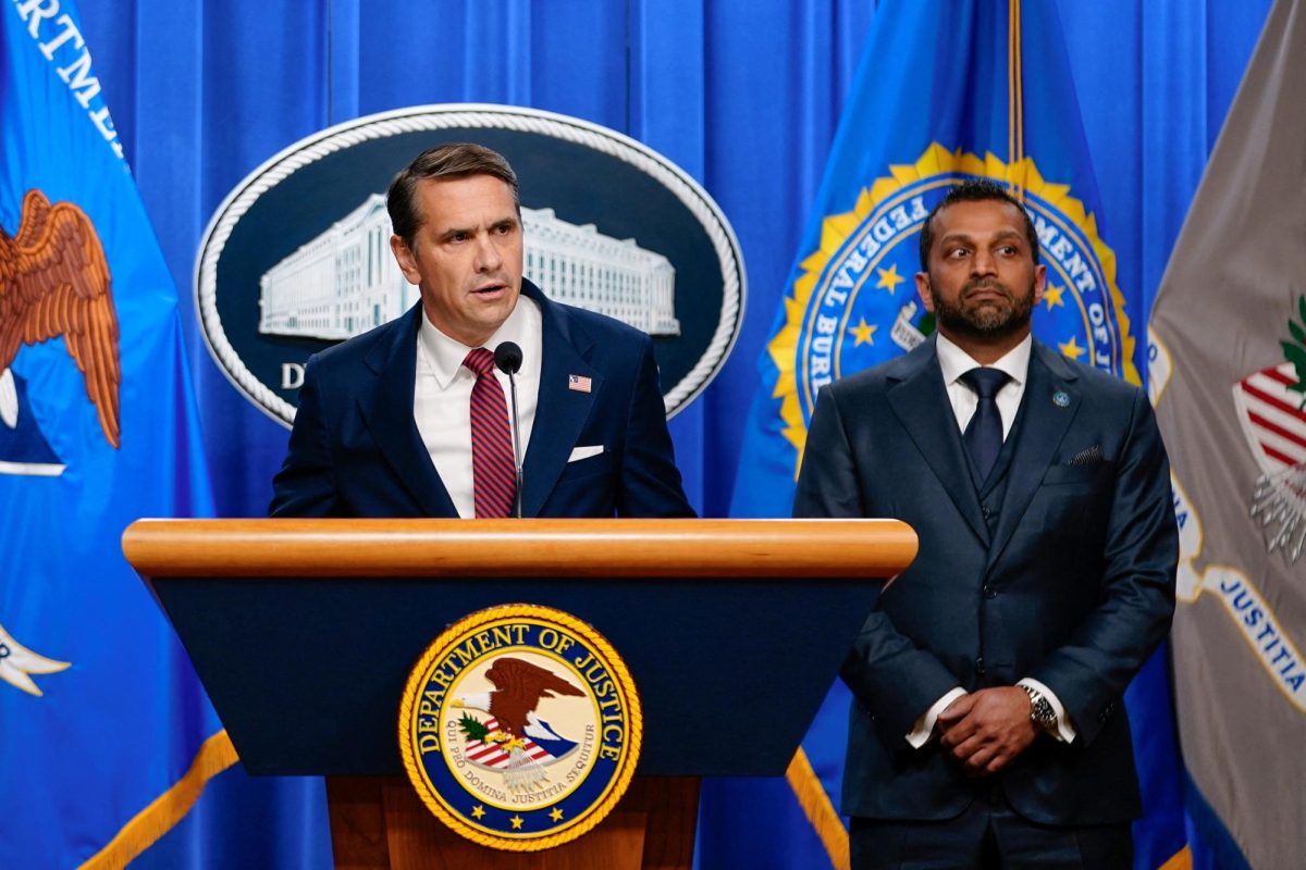 U.S. Federal Bureau of Investigation (FBI) Director Kash Patel listens as acting U.S. Attorney General Todd Blanche announces a second indictment of former FBI Director James Comey during a press conference at the Justice Department in Washington, D.C., U.S., April 28, 2026. REUTERS/Nathan Howard
